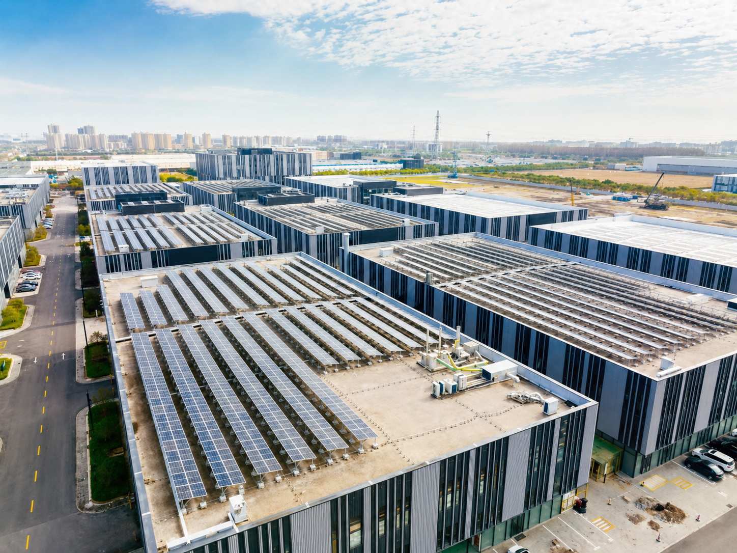 Aerial view of an industrial distributed generation rooftop solar installation